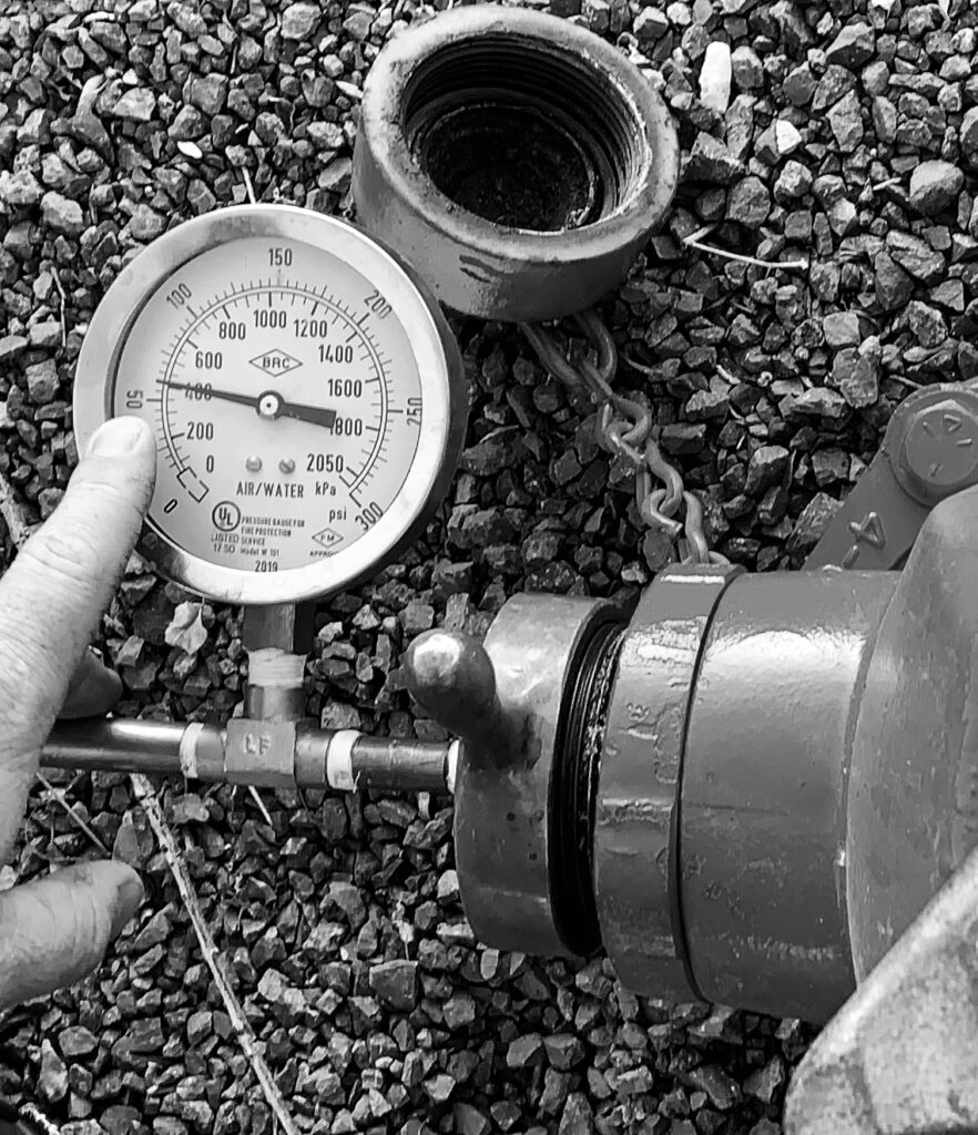 Pressure gauge reading on fire hydrant